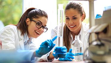 Two people working in a lab